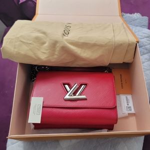 Louis Vuitton twist logo purse